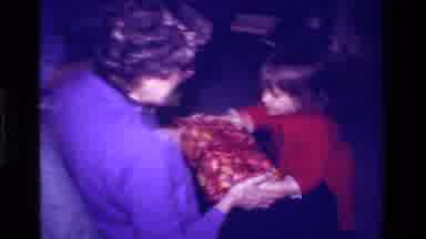 California USA (1979): A Christmas Package Being Delivered By A Kid