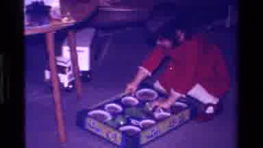 California USA (1979): People Opening Gifts On Christmas Morning In Living Room