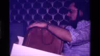 California USA (1979): Two People Opening Presents