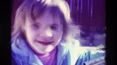 California USA (1979): A Little Girl Riding Her Toy Wagon