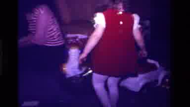 California USA (1979): A Young Girl Opening Her Gifts And Throwing Wrapping On The