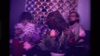 California USA (1979): Family Opening Christmas Presents At Home In A Home Video