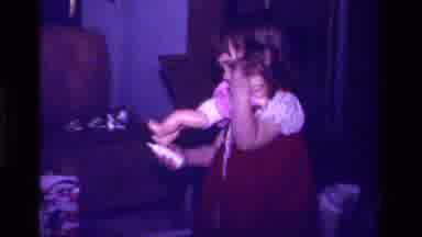 California USA (1979): A Baby Playing In Toys