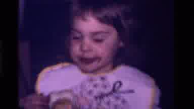 California USA (1979): Cute Girl Baby Eating Chocolate Love For Sweets Nutty