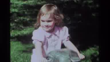 California USA (1979): Girl Enjoying Day At Playground