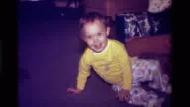 California USA (1979): Cute Baby Having Fun In A Room