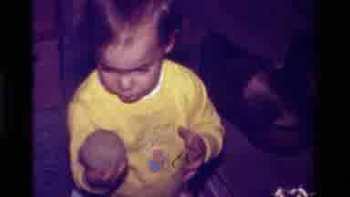 California USA (1979): Homemade Video Of Baby In The Yellow Shirt Eating Caca