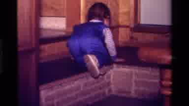 California USA (1979): Indoor Baby Crawling Window Climbing Unattended First Steps
