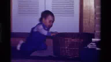 California USA (1979): Happy Small Child Playing With Basket