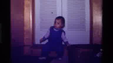 California USA (1979): The Baby Was Sitting In Front Of The Door And Doing