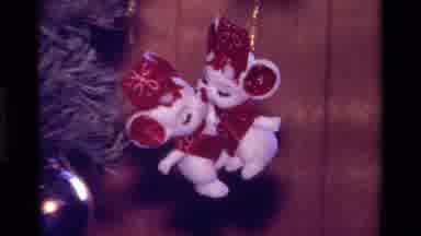 California USA (1979): A Little Girl In A Blue Shirt And An Ornament With Two