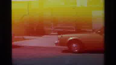 Laguna Beach California USA (1979): A Woman In Blue Shirt And Pants Trying To Take