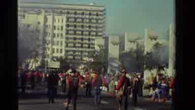 California USA (1981): The View Of Horses And People Walking Down A Street In A
