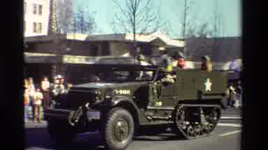 California USA (1981): Truck And Military Parade Down A Street