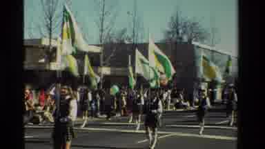 California USA (1981): A Group Of Girls Marching In A Parade With Their Green
