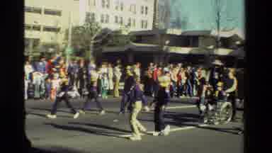 California USA (1981): Boy Scouts And Girl Scouts Proudly Walking Down A Street In