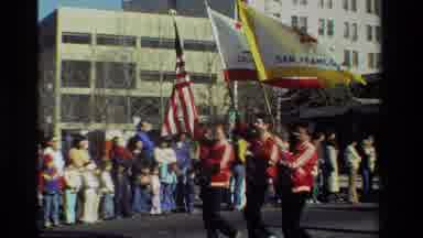 California USA (1981): A Group Of Individuals Are Marching In The Streets With