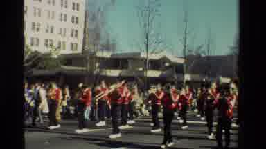 California USA (1981): Marching Band And Dancers Marching In The Parade As The The