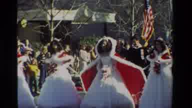 California USA (1981): People Gather For A Parade Some People On Foot While Others