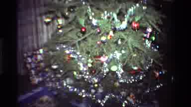 California USA (1981): Zooming Into A Decorated Christmas Tree In A Living Room