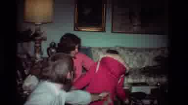 California USA (1981): A Little Girl In A Pink Jacket Twirling Around In Front Of