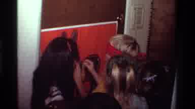 California USA (1981): A Boy Pinning The Tail On The Donkey While Other Children