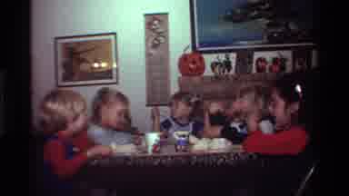 California USA (1981): Woman Providing Beverages To A Table Of Young Children