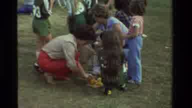California USA (1981): A Team Of Soccer Children Taking A Break To Eat Oranges