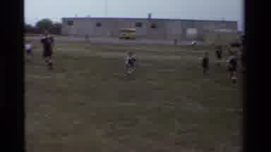 California USA (1981): Man Elementary-Middle School Youth Playing Soccer In A