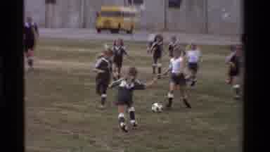 California USA (1981): Kids Playing Soccer At School