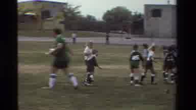 California USA (1981): Kids Playing Sports Working Together And Huddling Together