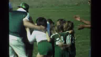 California USA (1981): Girl Child Soccer Team Game Huddle With Coaches On Field