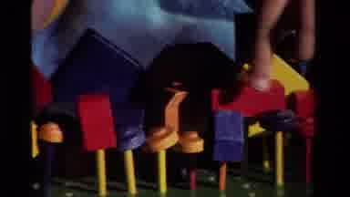 California USA (1981): Kid Showing Camera Wood Block Set He Built