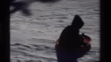 California USA (1981): Children Playing And Sledding Down A Snowy Hill In Winter