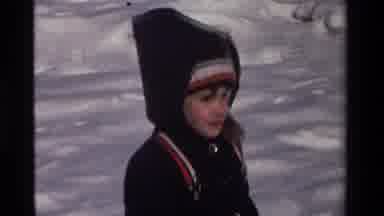 California USA (1981): Sliding Down Snow Slope Fun Coat Cozy Tree Little Boy