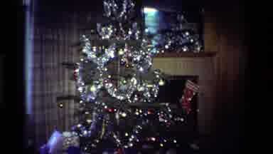 California USA (1984): Christmas Tree Decked In Tinsel With Presents Grouped