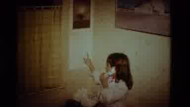 California USA (1984): Little Girl Talking On The Phone Smiling And Laughing