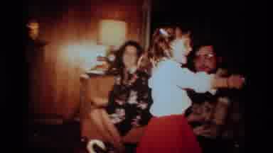 California USA (1984): Child Enthusiastically Gives Her Christmas Gift To Dad