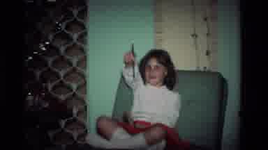 California USA (1984): Little Girl In White Blouse Showing Off Her Cool Paint