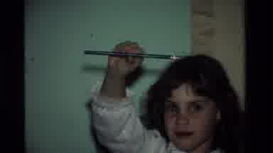 California USA (1984): Young Child Showing Off Her Unused Number Two Pencil In Her
