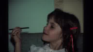 California USA (1984): Young Girl Looking At And Showing Off Her New Pencils