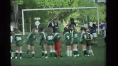 California USA (1984): Children In Soccer Uniforms Standing Ina Lineup Looking At