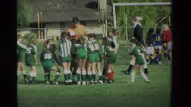 California USA (1984): Little Girls Huddling Up During A Very Happy Soccer Game