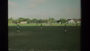 California USA (1984): Children's Soccer Team Practices Dribbles And Passing While