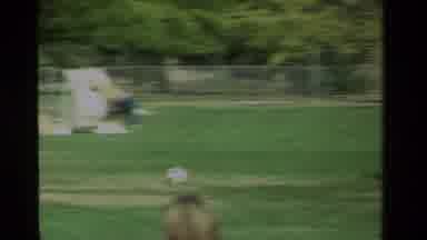 California USA (1984): Kids Playing Soccer Outside On A Hot Sunny Day On The