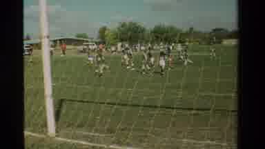 California USA (1984): Girls Soccer Match With One Team Wearing Blue Jerseys And