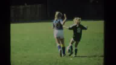 California USA (1984): Young Kids Hussle After A Soccer Ball During A Competitive