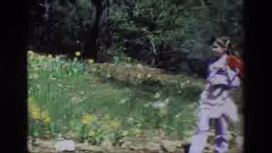 Daffodil Hill California USA (1985): Young Girl With Her Red-Haired Doll Walking