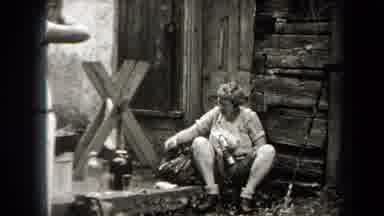 New York USA (1938): People Working At Their House And The Landscape Of A City