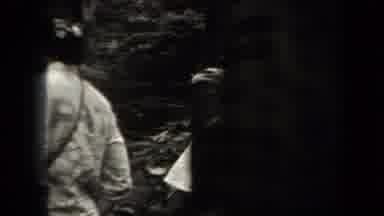 New York USA (1938): A Group Of People Hiking In The Woods